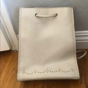 Ivory backpack-style purse